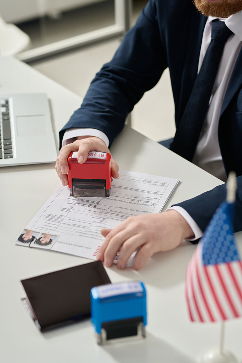 A photo of someone organizing their immigration documents.